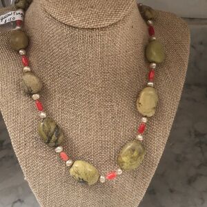Yellow turquoise surrounded by Pearls and coral